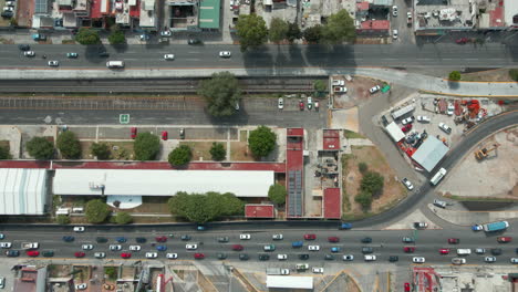 bird's eye perspective of busy urban expressways in mexico city's suburbs