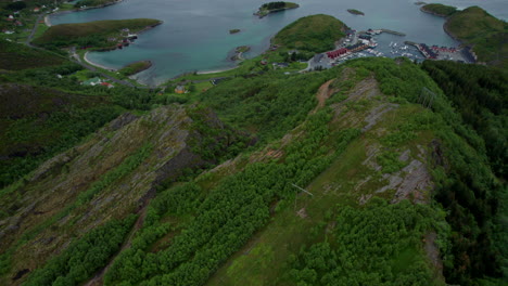 Aerial-revealing-shot-of-a-dramatic-landscape-in-Northern-Norway,-Helgeland,-Nordland