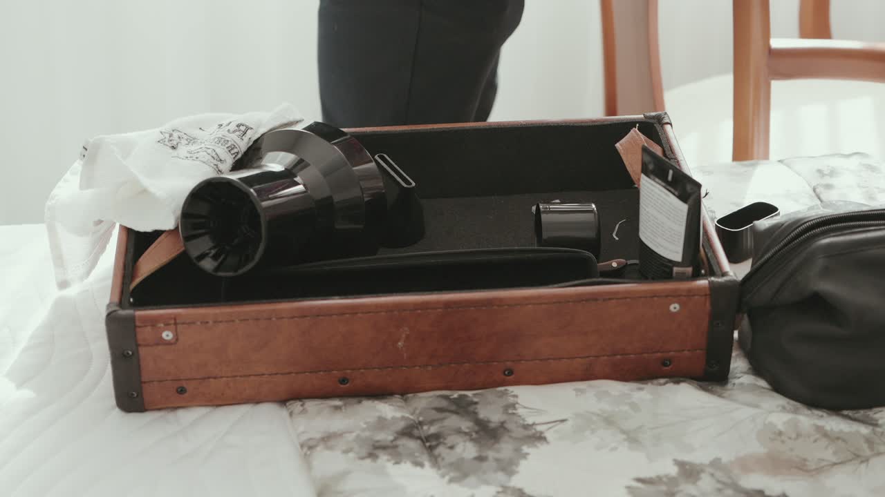 Timeless barber tools rest in a rustic case, evoking nostalgia