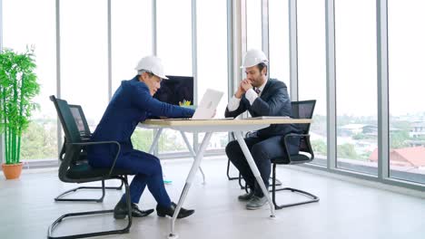 engineer and architect meeting at office table