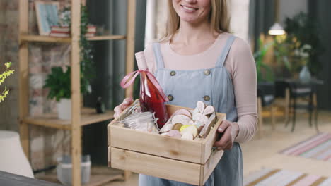 portrait of woman posing with easter gift basket