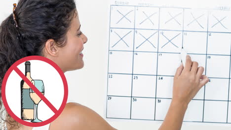 animación de una señal de alto y vino, sobre una mujer caucásica sonriente que cruza los días de enero en el calendario