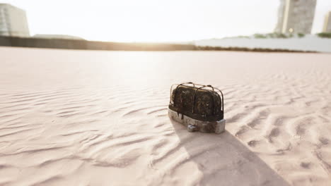 old rusted trash on the sand beach