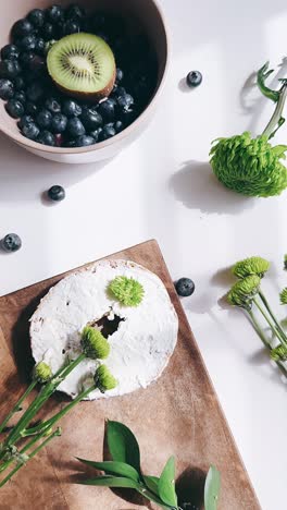 healthy breakfast with fruits and flowers