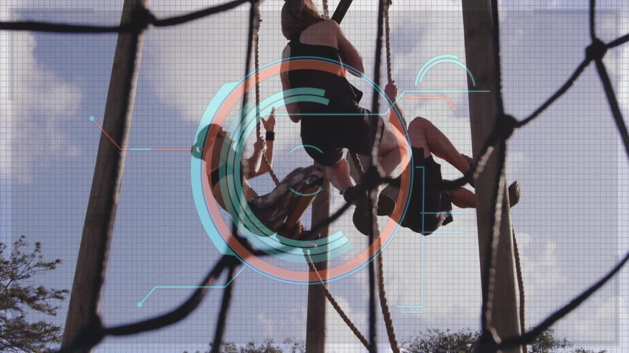 Climbing ropes in school gym, people with digital interface animation overlay