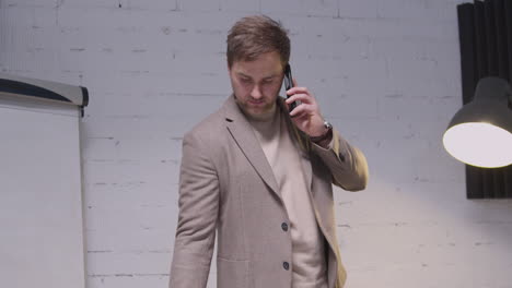 businessman using mobile phone in the office