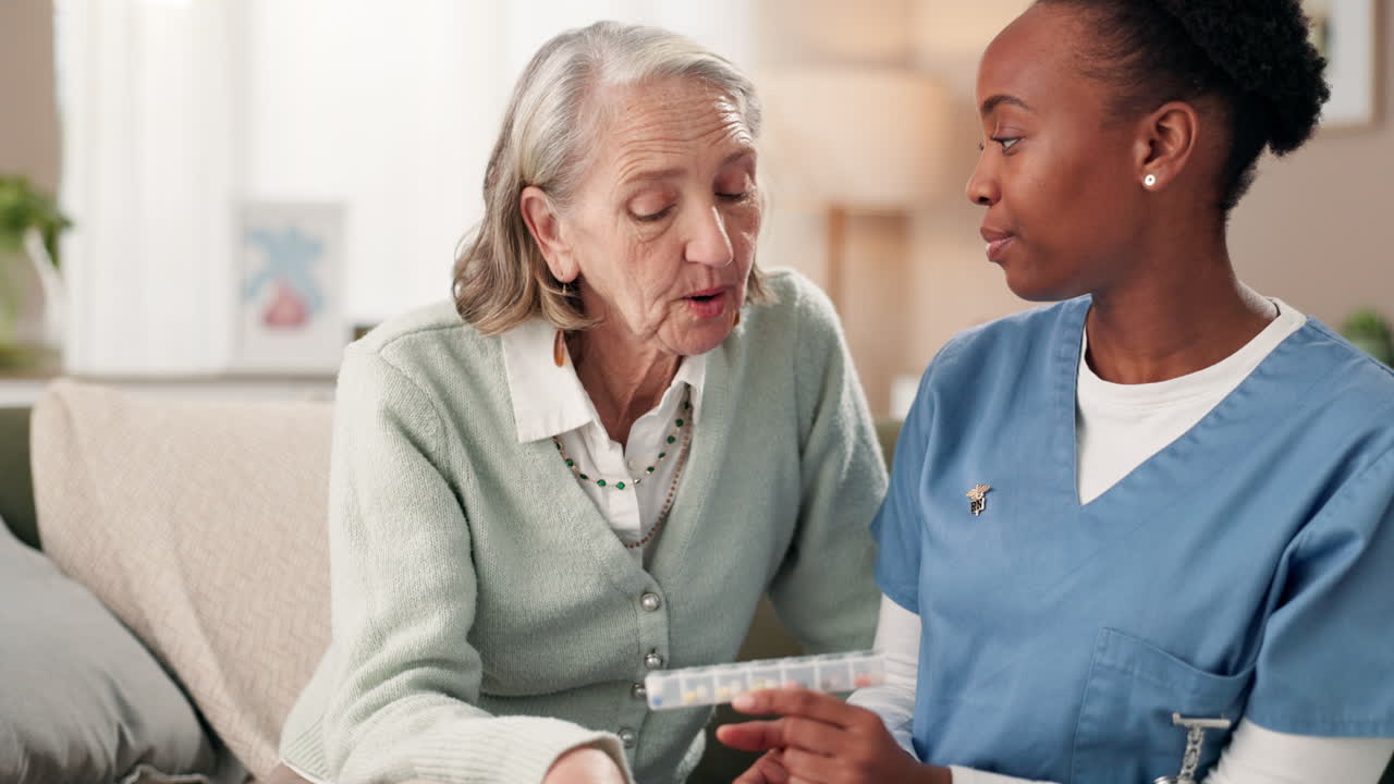 Elderly Woman Receiving Medication Assistance