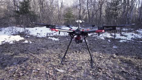 drone in a snowy forest