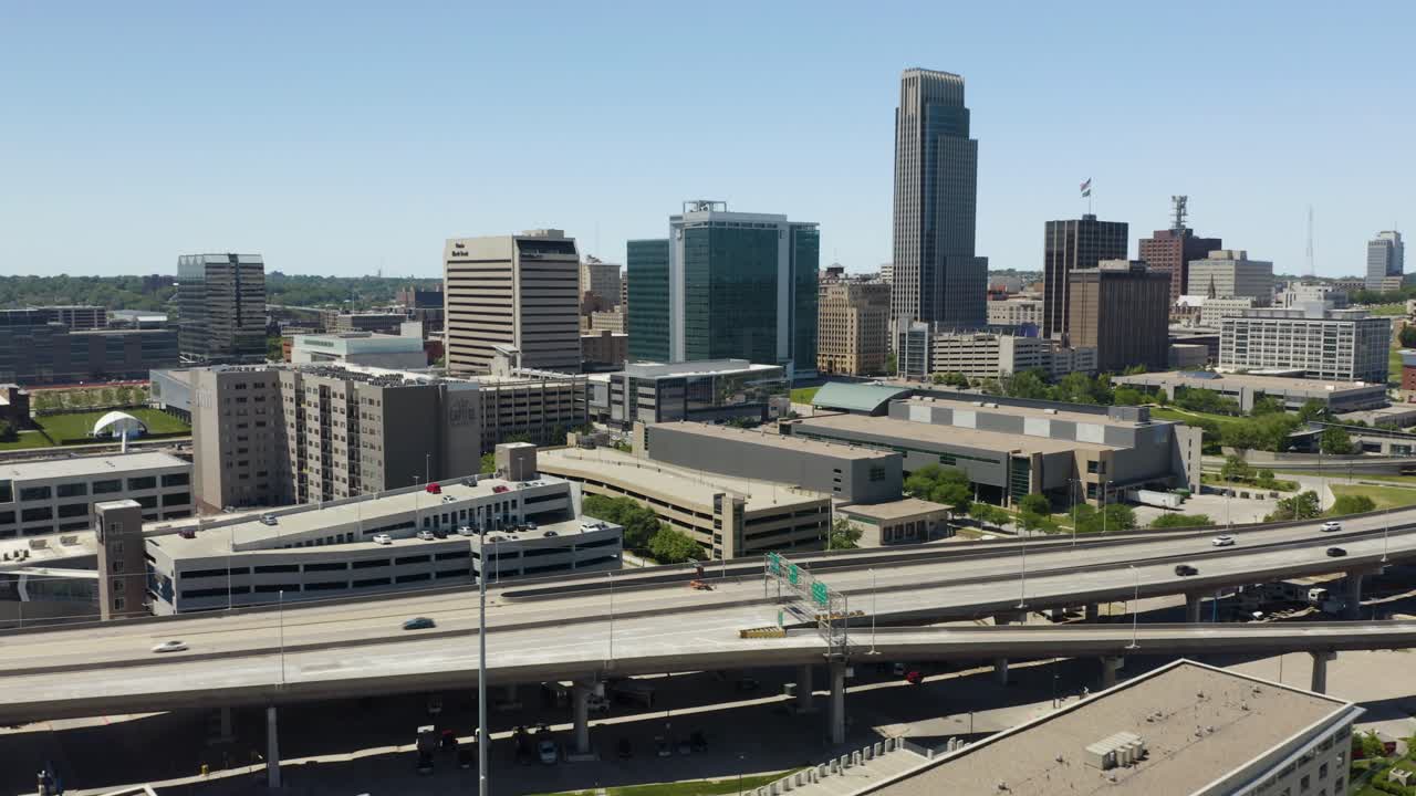 Cars Driving on Highway with Downtown Omaha, Nebraska Skyline in Background