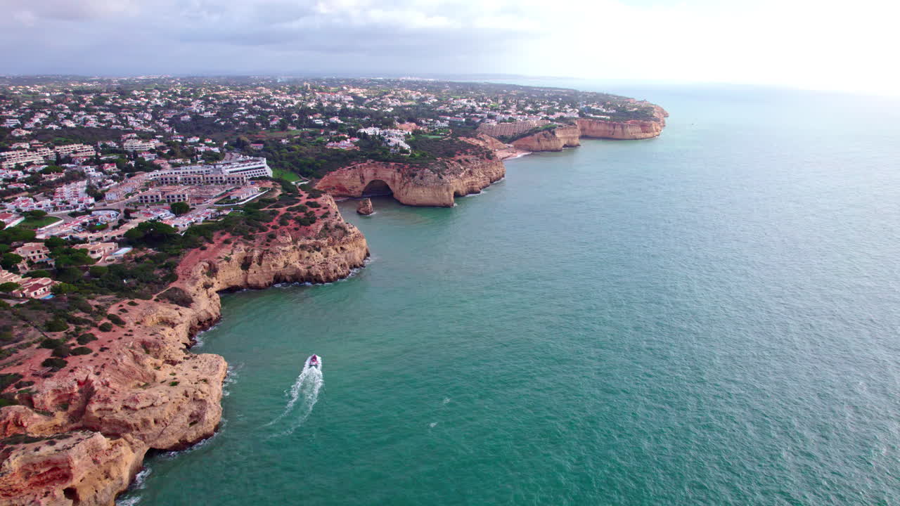 Aerial footage of the costline of Lagoa, near Carvoeiro, in Algarve, Portugal