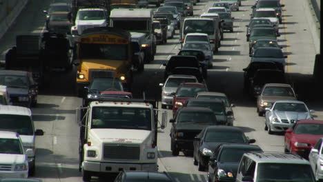 traffic moves slowly along a busy freeway in los angeles 9