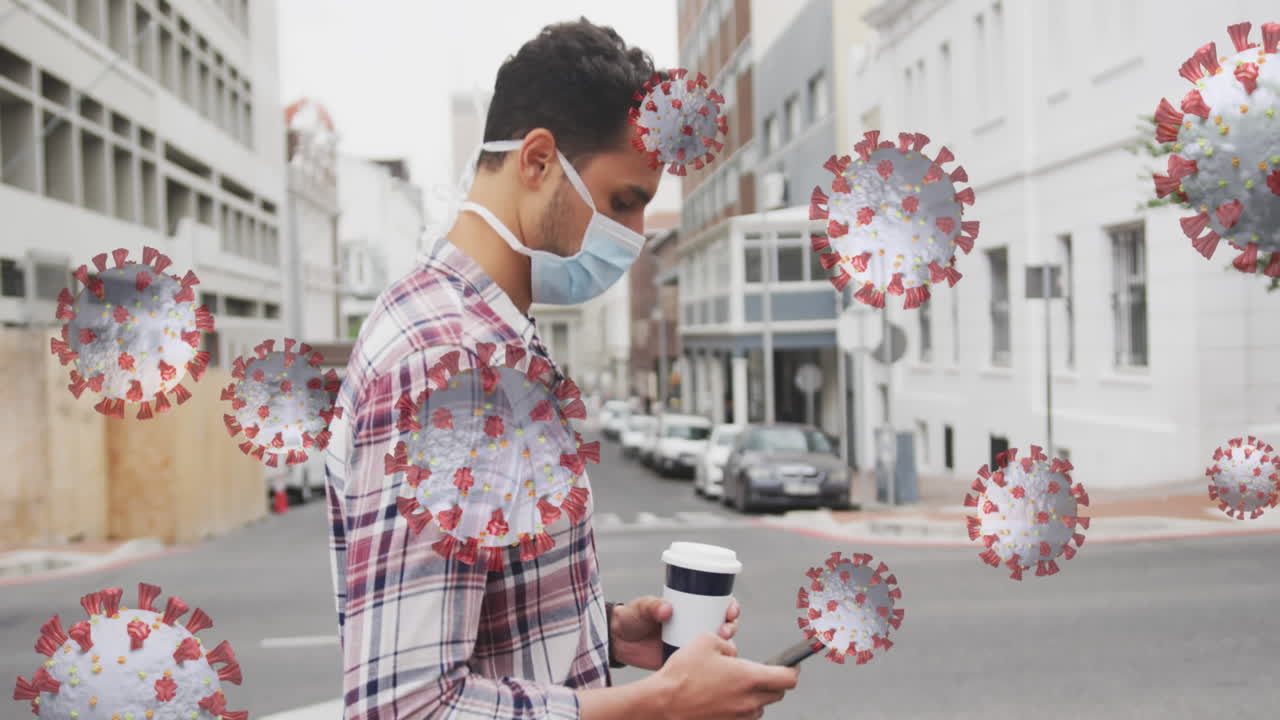 얼굴 마스크를 쓰고 있는 백인 남성에 대한 바이러스 세포의 애니메이션