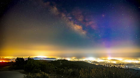 glowing camping site with shooting falling stars cosmic background time lapse static shot