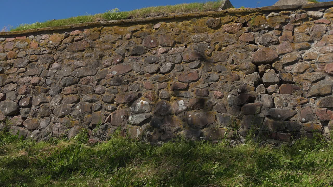 An outlook view of the stone wall of Museum fortress Korela, Russia