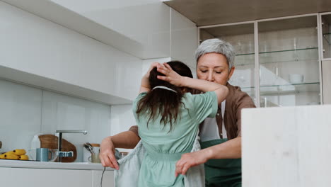 Grandma-and-girl-wearing-aprons