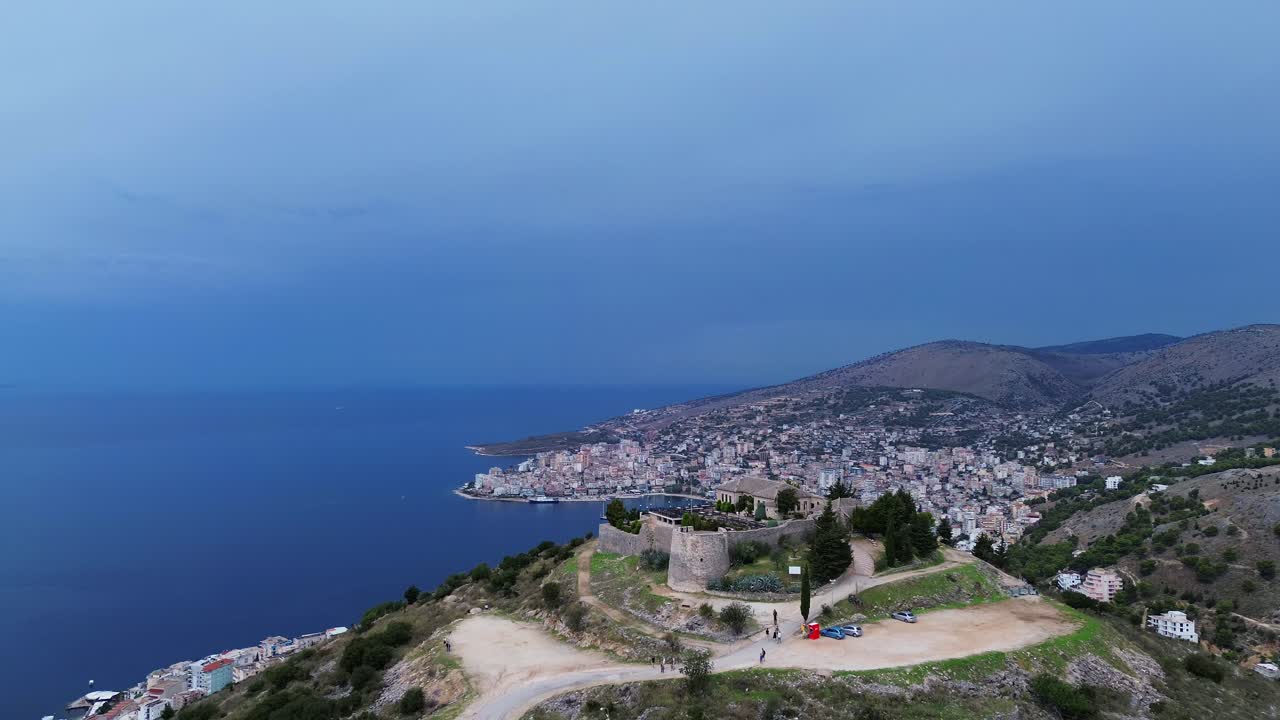 Lekuresi castle ruin Kajala e Lëkurësit Saranda Albania city aerial view