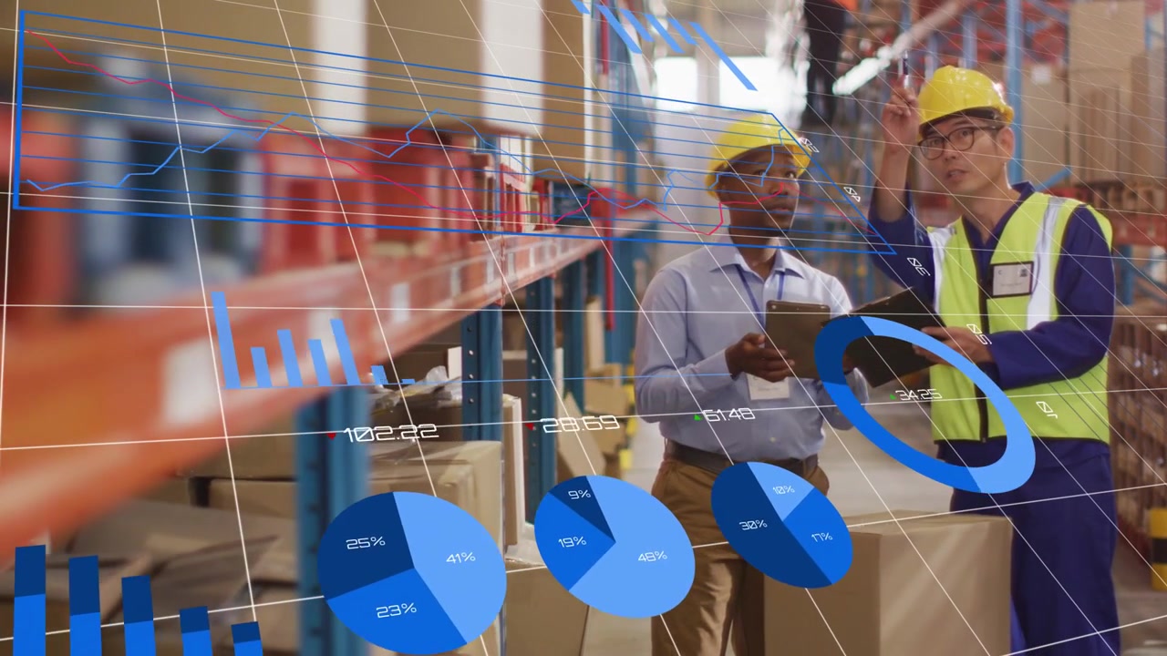 2 warehouse team checking tablet and clipboard tapping tablet showing blue charts verifying stock