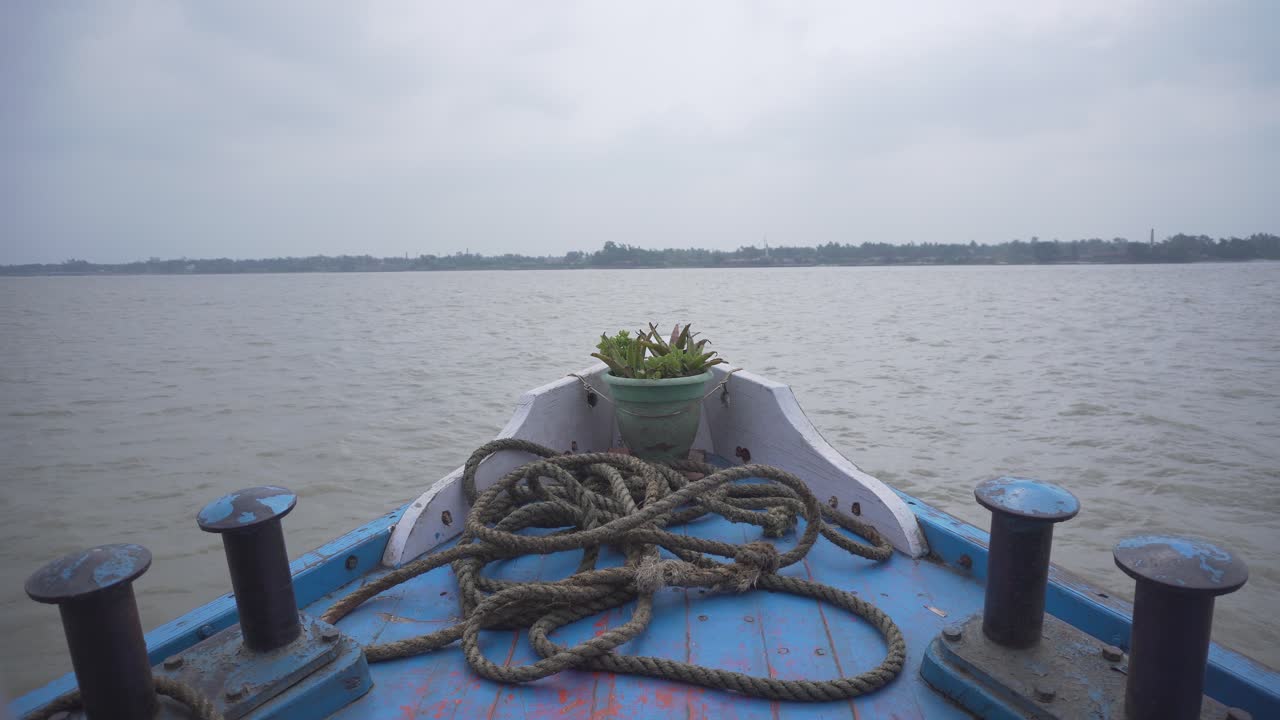 A boat is sailing on the Ganges River.