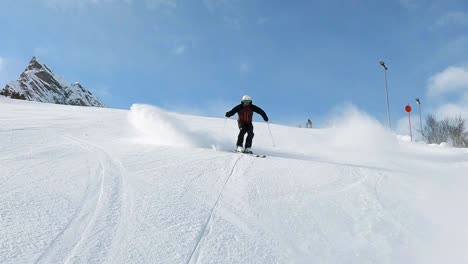 Professional-skiing,-beautiful-short-ski-turns-on-a-long-and-steep-ski-slope-in-the-mountains-of-tyrol