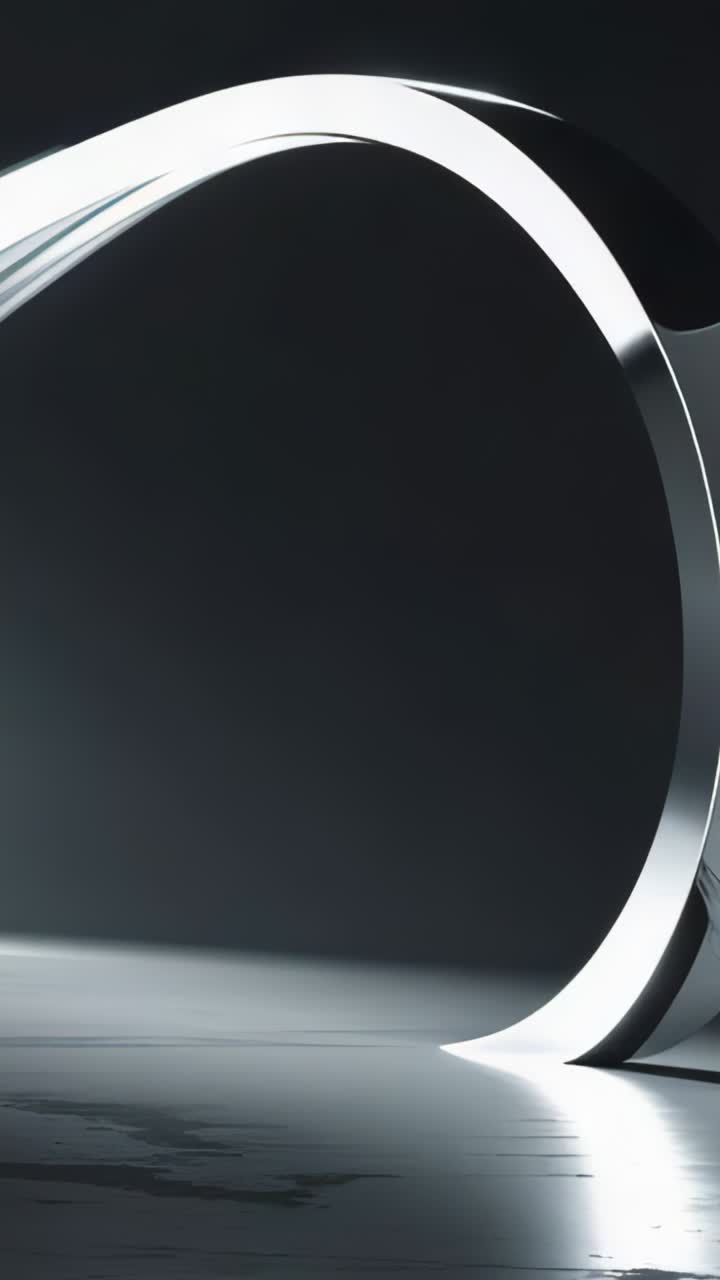 Vertical video: Starting curved metallic ribbon rotating left, revealing U-form on floor in studio