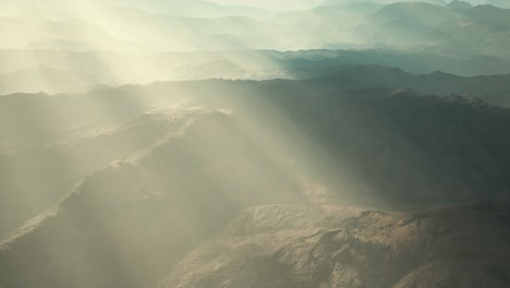 aerial vulcanic desert landscape with rays of light