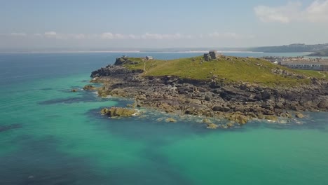 cornish coastline, popular tourist destination town in summer, aerial view