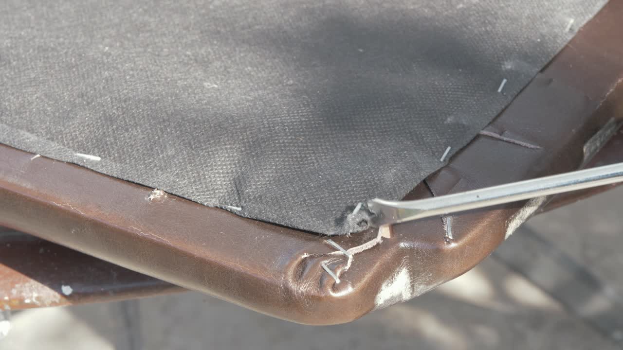 Removing staples from seat cushion Upholstery