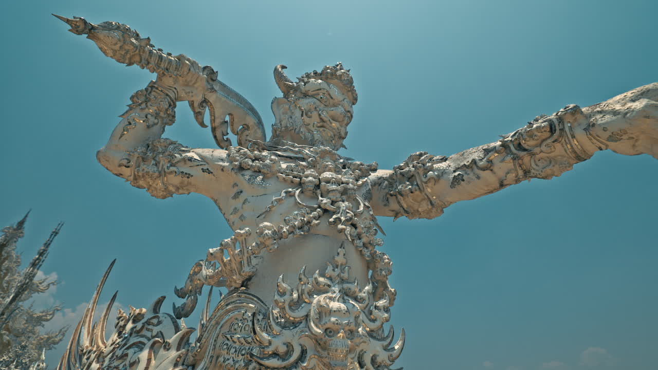 Detailed view of a white sculpture at Wat Rong Khun, Chiang Rai, Thailand