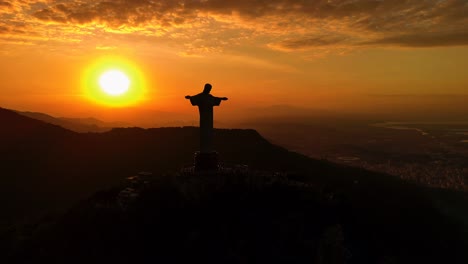 sunset over rio de janeiro with christ the redeemer