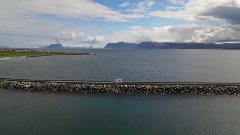 A-minivan-ride-on-rocky-bridge-in-norway