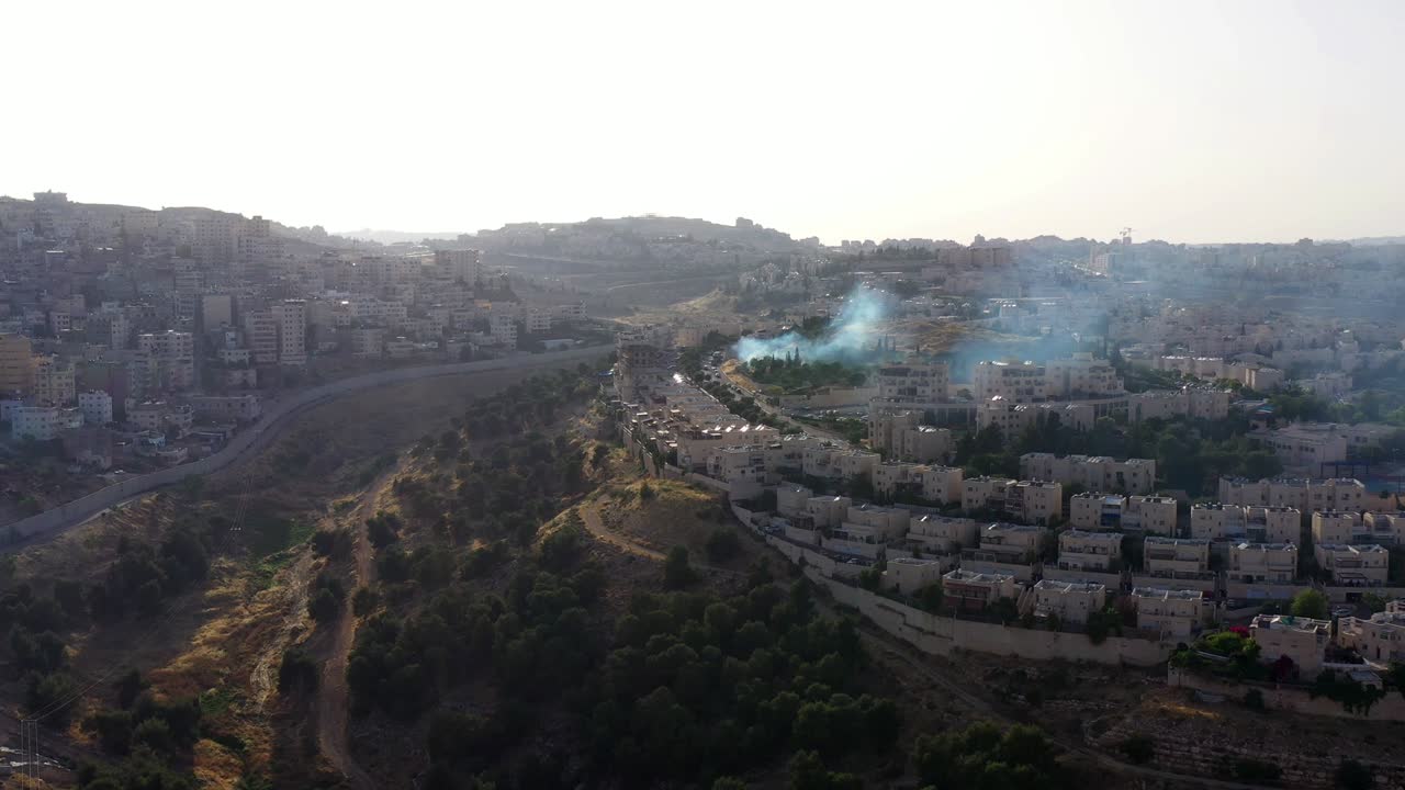 Smoke rising in Jewsih neighbourhood Near Palestine border-Aerial