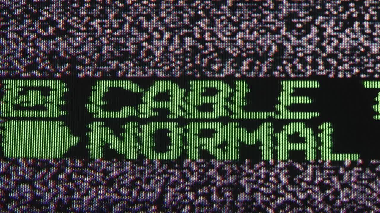 Green Pixelated 'CABLE NORMAL' Text on TV Static Screen