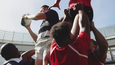 rugby players playing rugby match in stadium 4k