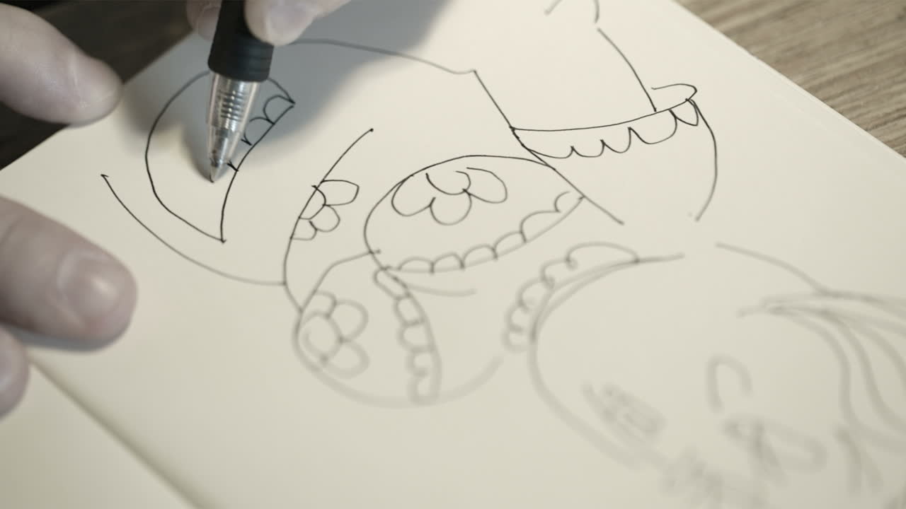 펜으로 손으로 그림을 그리는 것