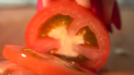 knife cuts vegetables for salad in slow motion