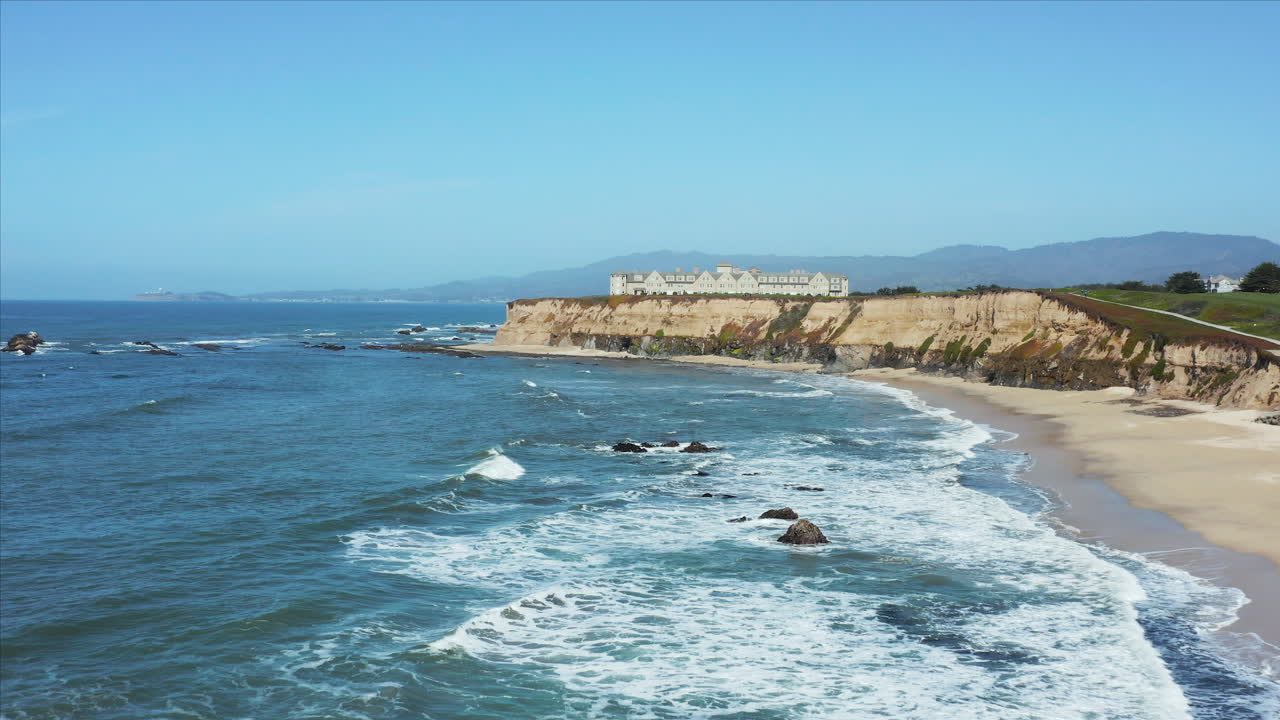 Aerial drone shot of the Ritz Carlton Hotel in Half Moon Bay, California, USA