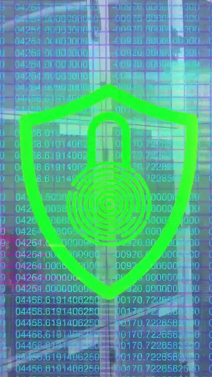Vertical video: Shield lock pulsing and cycling color over glass with digit matrix on security scan