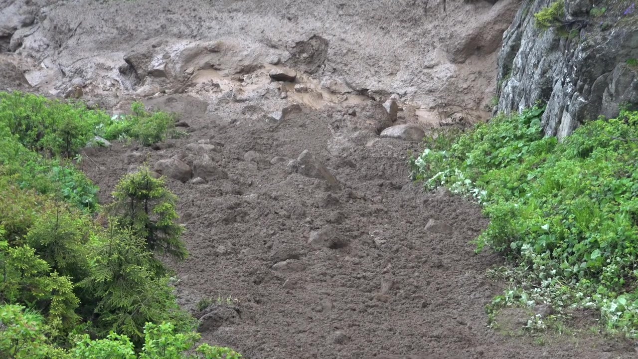 Mudslide Flowing Down a Mountain Slope