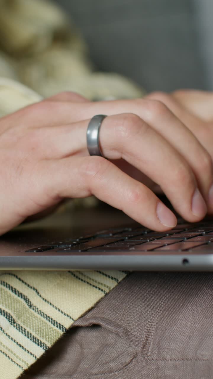 Person typing on a laptop