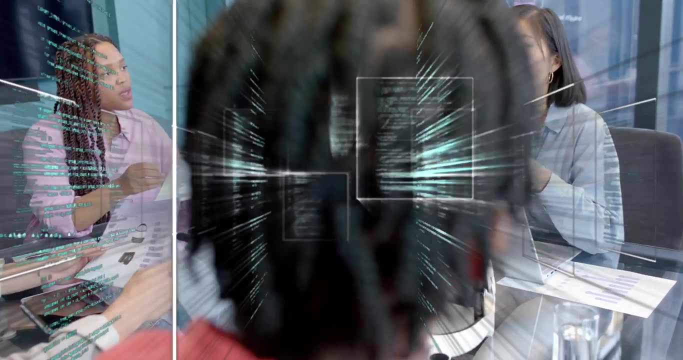 Systems architect gesturing laptop specs at VR headset, using code overlays animating tech design