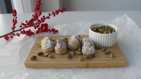 shot zooming on a setup for food photography, chewy pistachio amaretti christmas cookies