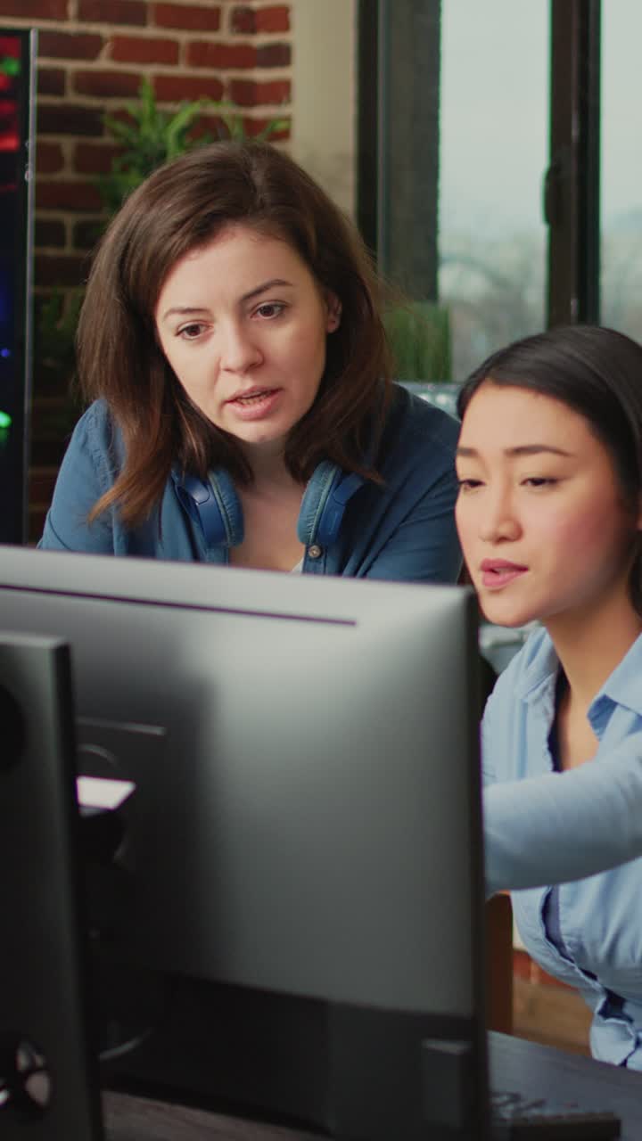 Vertical video: Diverse women brainstorming ideas to develop artistic content