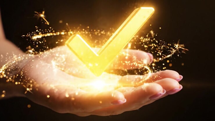 A Stunning Symbol of Approval: A Golden Checkmark Appears Above an Open Hand, Representing Achievement, Success, and Confirmation in an Elegant, Visually Striking Setting