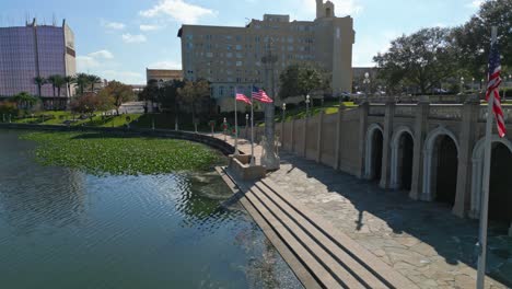 aerial fly by of the loggia on lake mirror in lakeland, florida