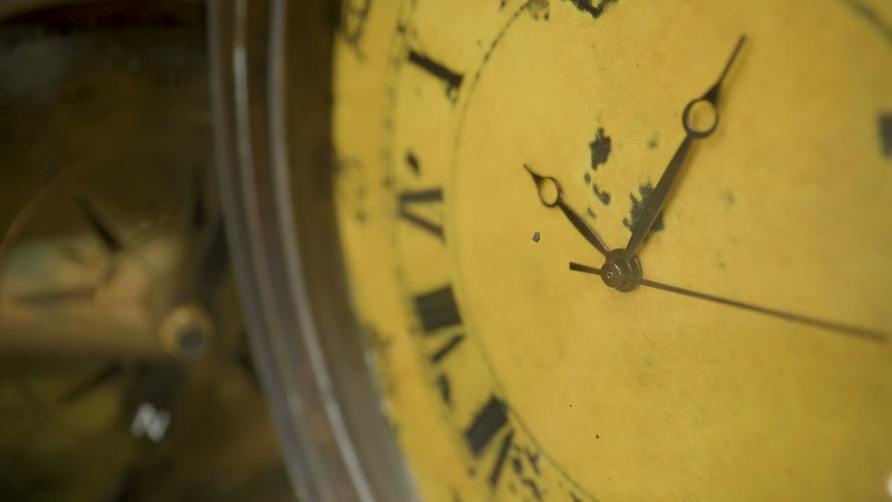 The fast moving hand of the pocket clock