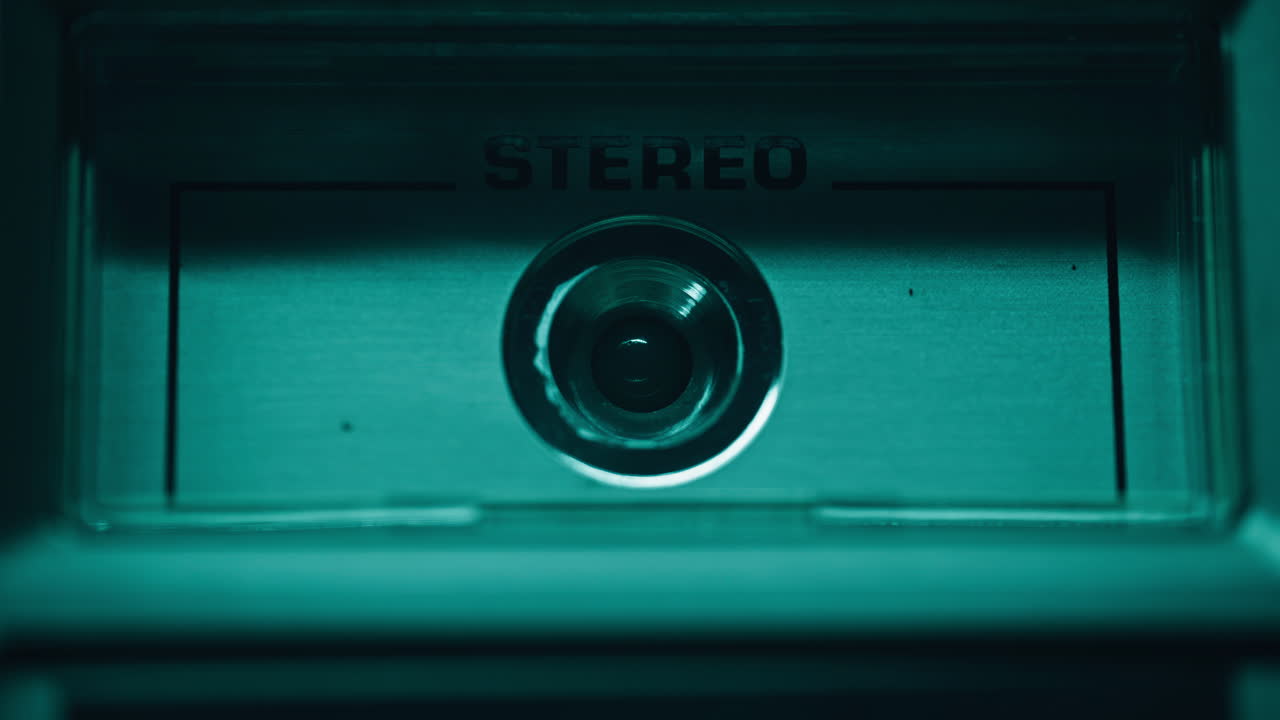 Red beam indicates device status inside studio closeup. Audio receiver signal