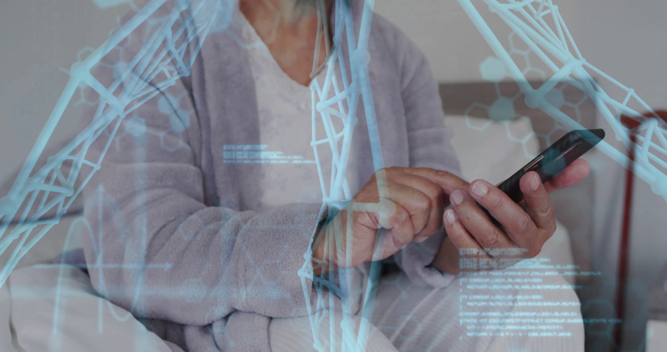 Senior woman tapping smartphone while sitting on bed, initiating blue code overlay for tech demo