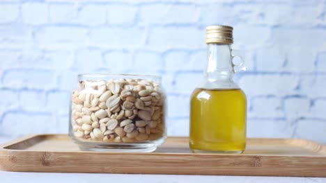 peanuts and oils in a container ,