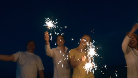 People-Waving-Lighting-Sparklers