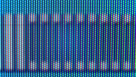 pixels in the working old analog tv screen close up. red, blue and green dot create the image on the screen. analogue retro tv settings menu in extreme close up